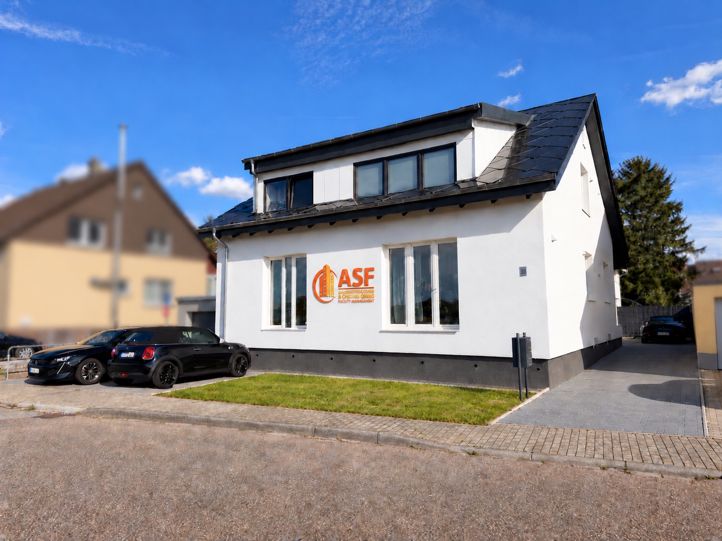 Firmensitz von ASF an der Pfinzstraße 30 in Karlsdorf-Neuthard mit visualisierter ASF-Beschriftung an der Fassade